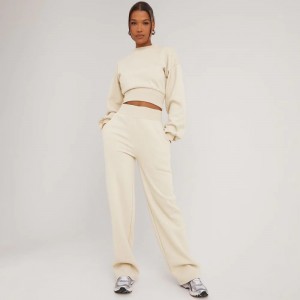 LONG SLEEVE ELASTICATED WAIST DETAIL CROPPED SWEATER IN CREAM