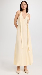Design a tapered elegant dress with streamers on the front and back