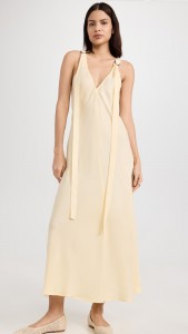 Design a tapered elegant dress with streamers on the front and back
