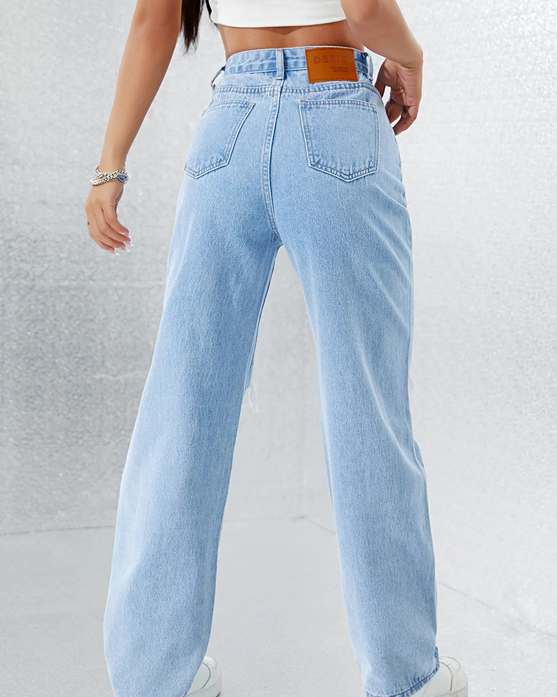 Factory made asymmetrical waist ripped straight jeans